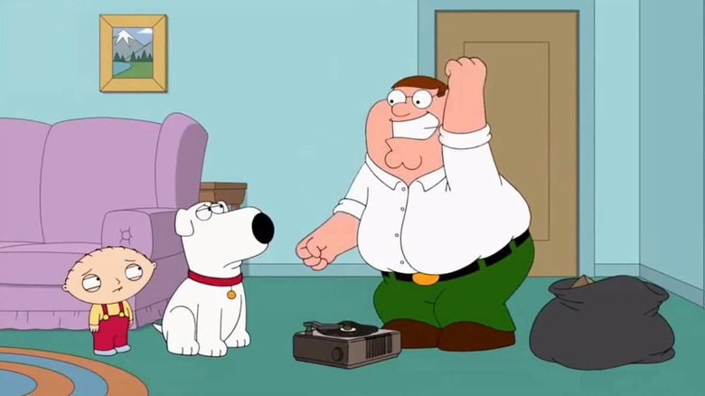 Peter dancing to surfin' bird while brian and stewie watch