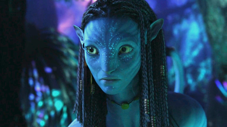 Neytiri stands in a forest