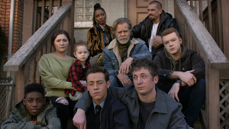 Gallagher family sitting on front porch