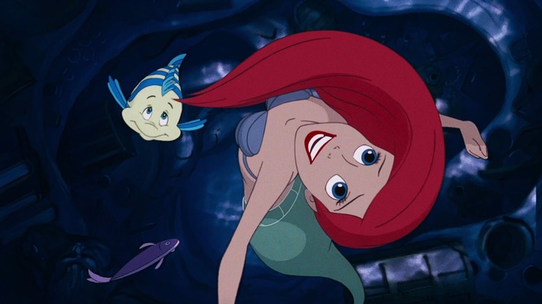 Ariel and flounder swimming 