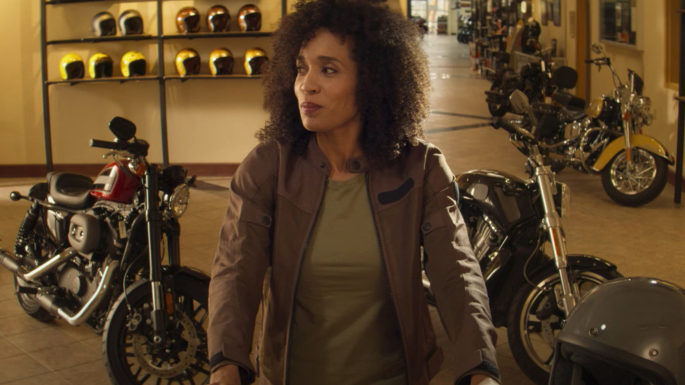 Woman in motorcycle shop