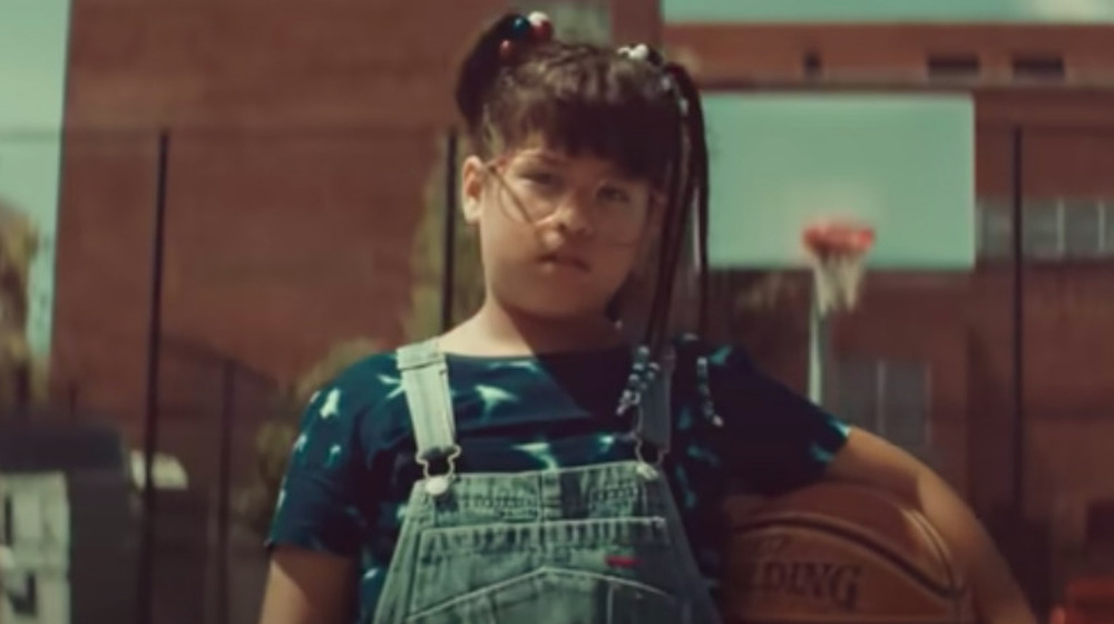 Little girl holding basketball