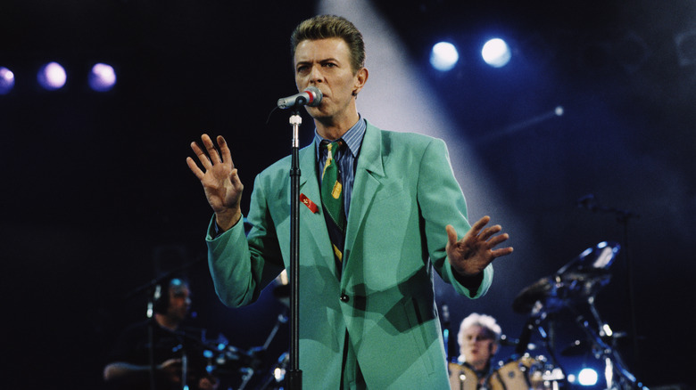 David Bowie performing with Queen