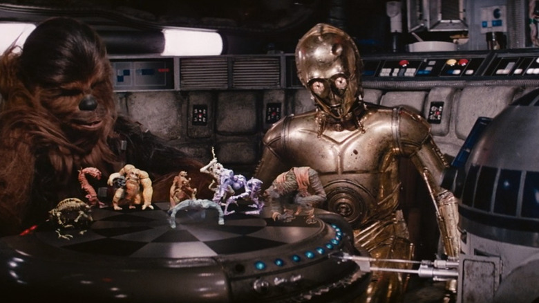 Chewbacca, C-3PO, and R2-D2 playing Dejarik