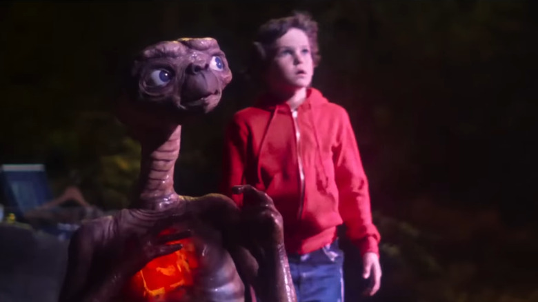 E.T. and Elliott looking at spaceship