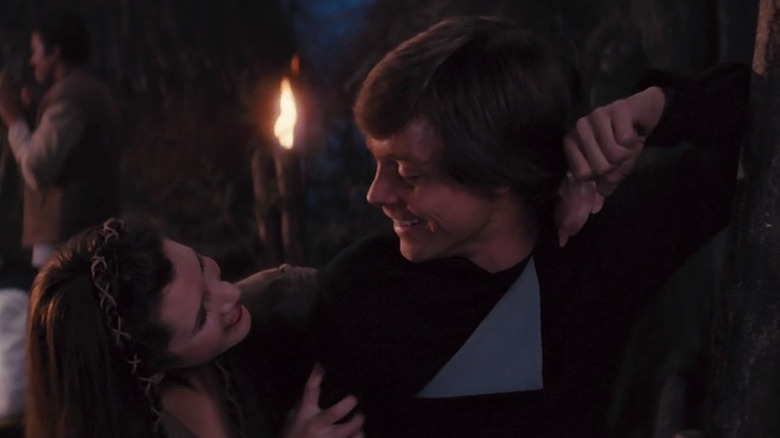 Leia and Luke smiling