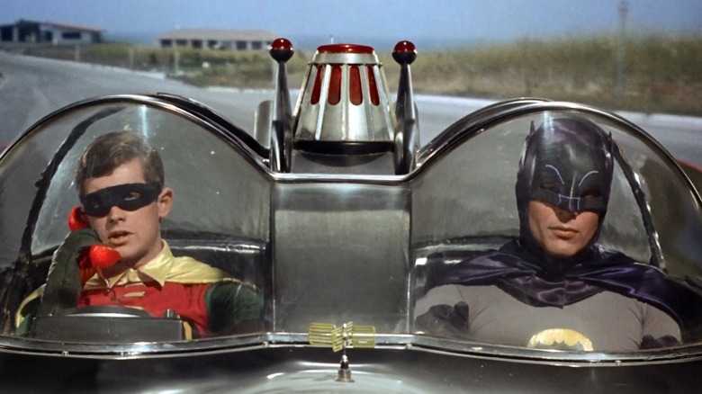 Batman and Robin driving