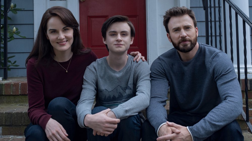 Chris Evans as Andy Barber, Michelle Dockery as Laurie Barber, and Jaeden Martell as Jacob Barber on Defending Jacob