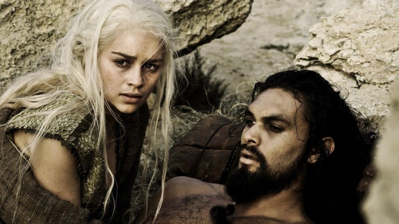 Daenerys leaning over sick Drogo