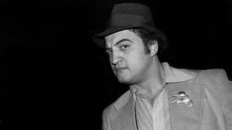 Belushi raising his eyebrow