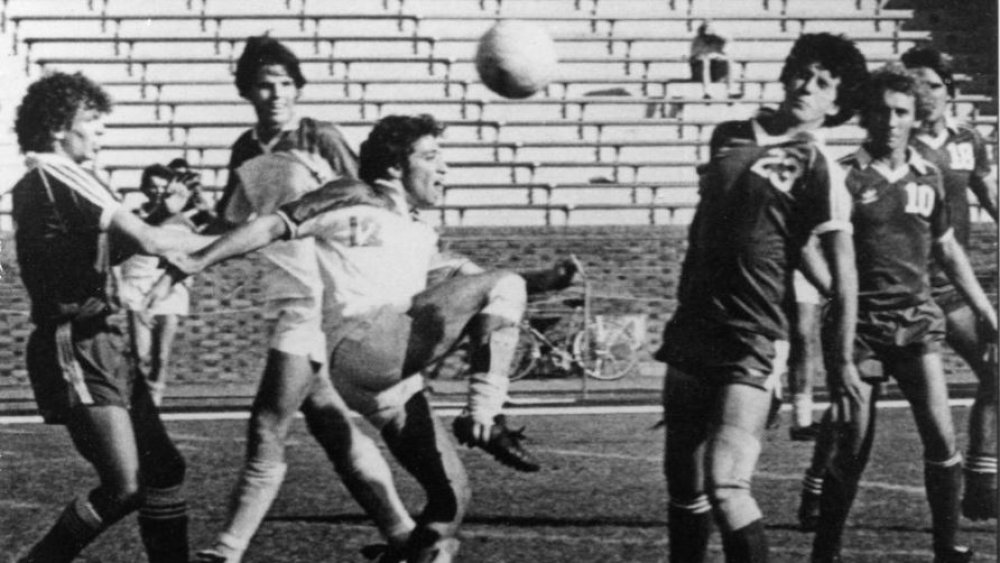 Jon Stewart playing soccer