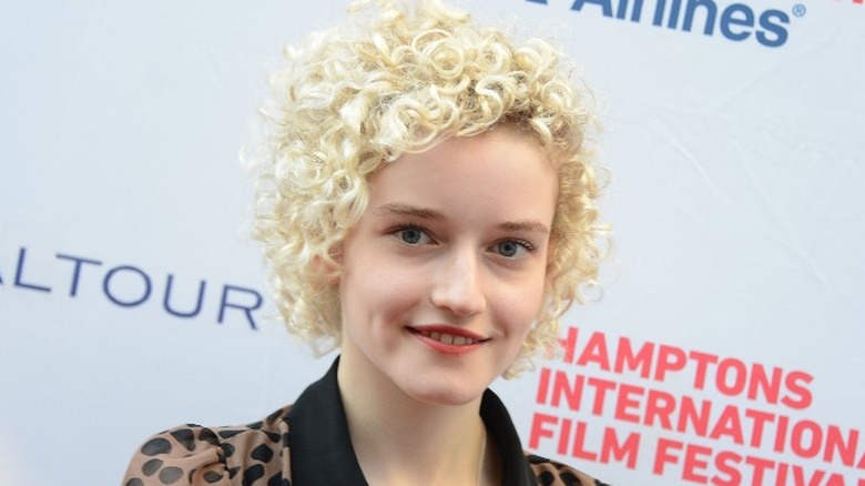 Julia Garner smiling on red carpet