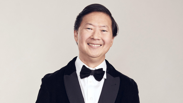 Ken Jeong smiling wearing tuxedo