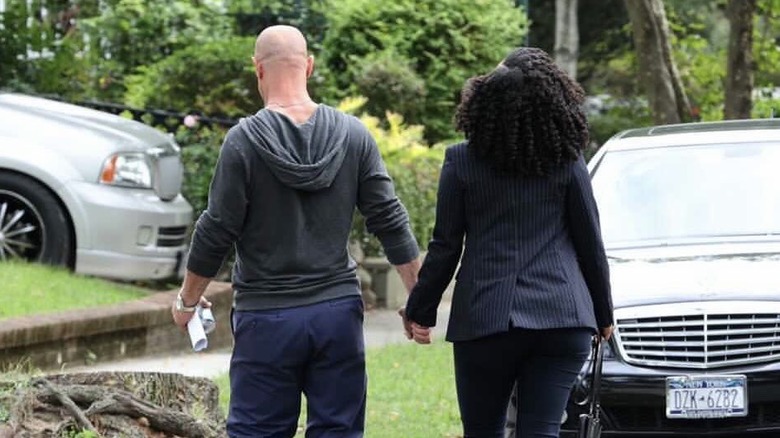 Christopher Meloni and Danielle Moné Truitt holding hands