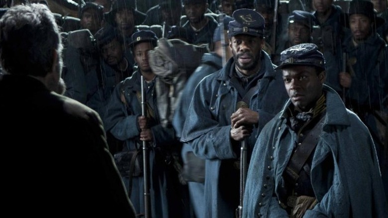 Black Union soliders face President Lincoln