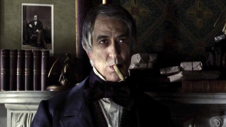 William Seward smokes a cigar