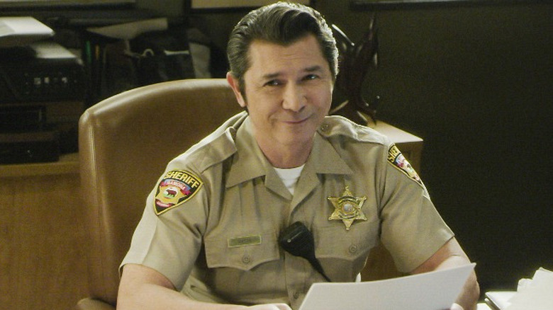 Sheriff Clifford Mason smiles