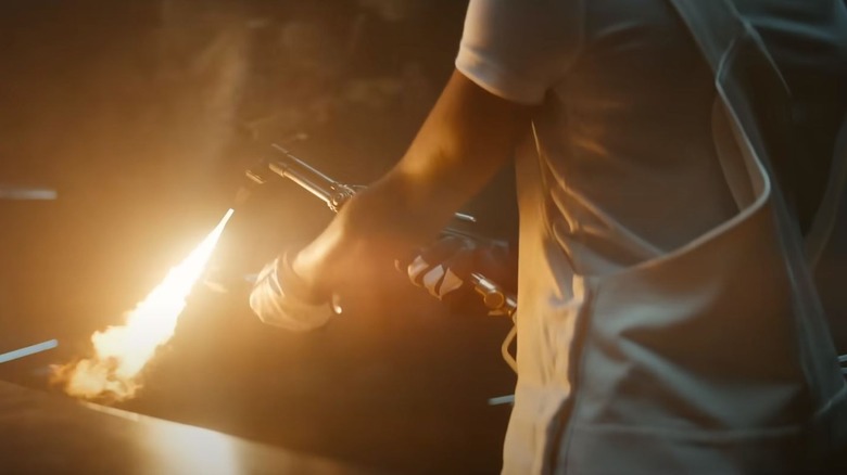 Riri Williams using a blowtorch