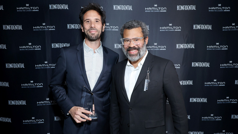 Guillaume Rocheron and Jordan Peele pose backstage