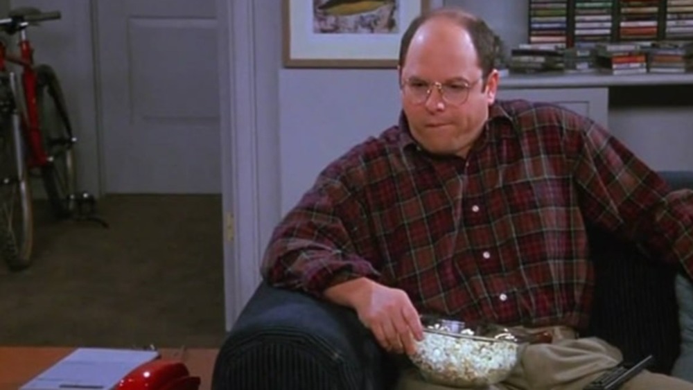 George Costanza eating popcorn