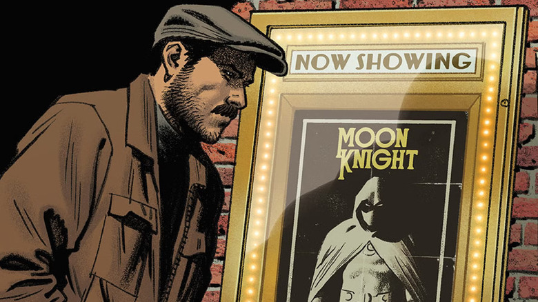 Jake Lockley walking past a Moon Knight poster in a comic