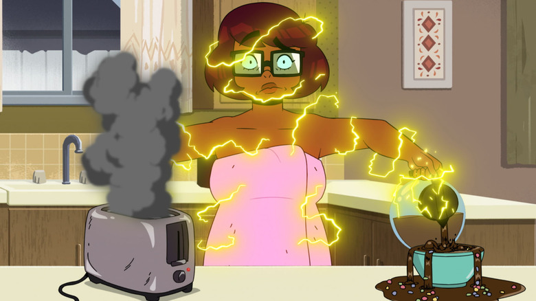 Velma getting electrocuted wearing towel