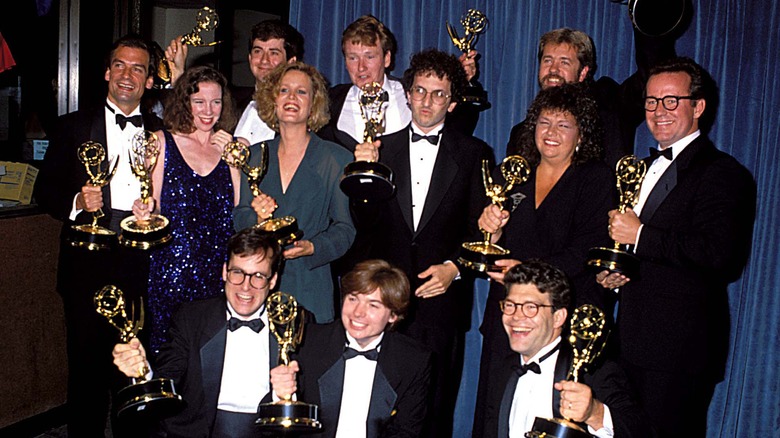 Hartman and SNL cast with trophies 