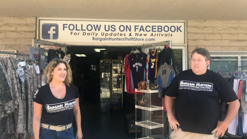 Casey and Rene Nezhoda in front of Bargain Hunters Thrift Store