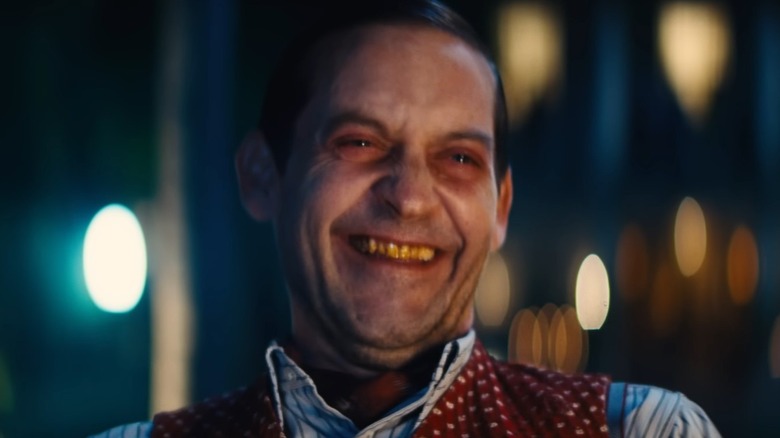 Tobey Maguire laughing with bad teeth