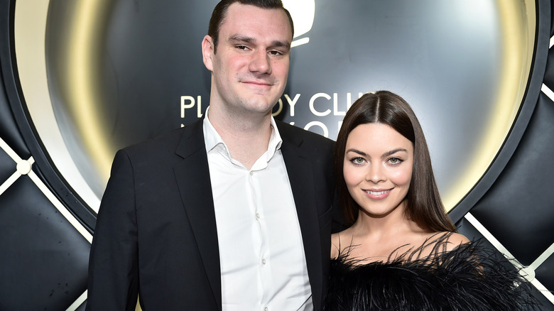 Scarlett Byrne alongside husband Cooper Hefner