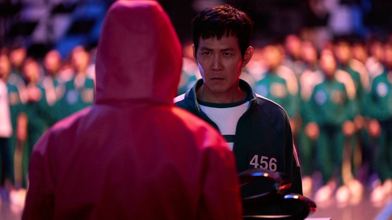 Seong Gi-hun looking at soldier on Squid Game Season 2