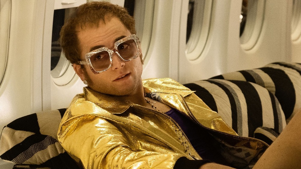 Taron Egerton Elton John gold jacket plane