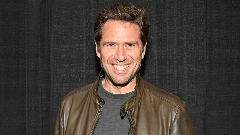 Alexis Denisof smiling