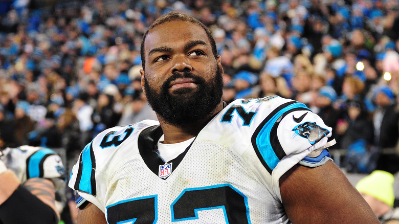 Michael Oher wearing football uniform