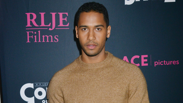 Elliot Knight posing at a press event