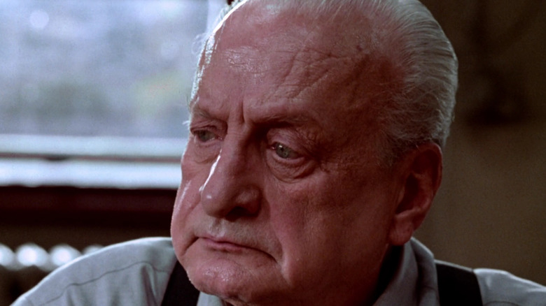 George C. Scott looks contemplative