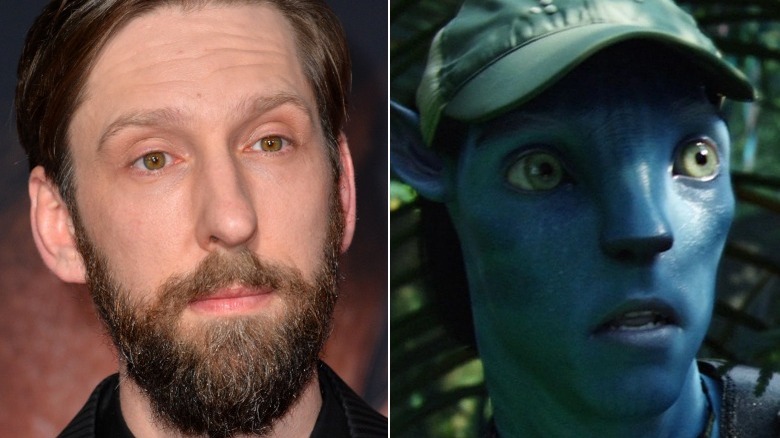 Joel David Moore and Norm wide-eyed