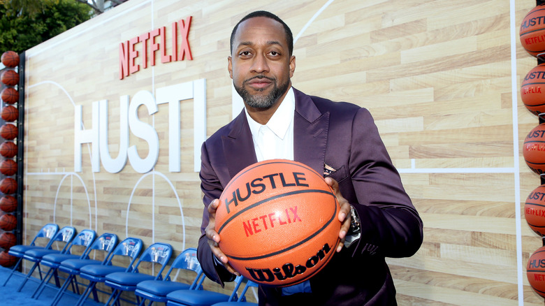 Jaleel White smiles at a red carpet event