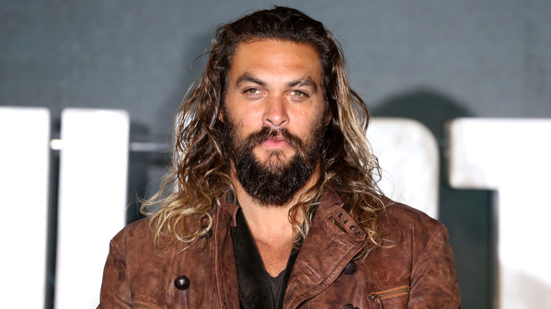 Jason Momoa attending an event for Justice League.