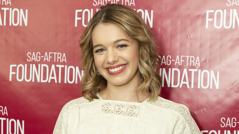 Sadie Calvano tilts head and smiles