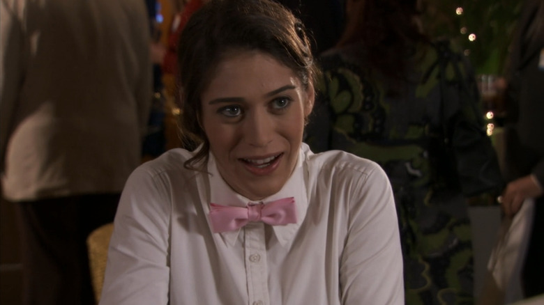 Lizzy Caplan cackling