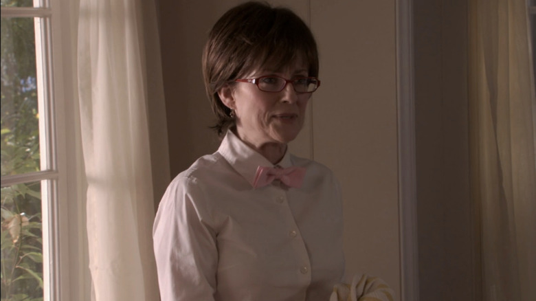 Megan Mullally wearing glasses