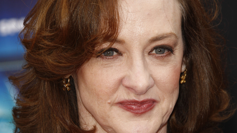 Joan Cusack smirking