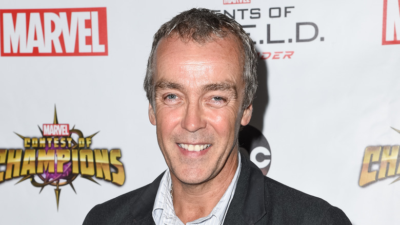 John Hannah smiles