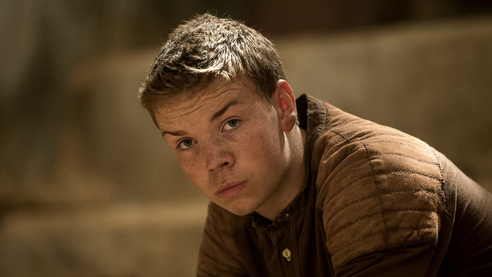 Will Poulter pensive