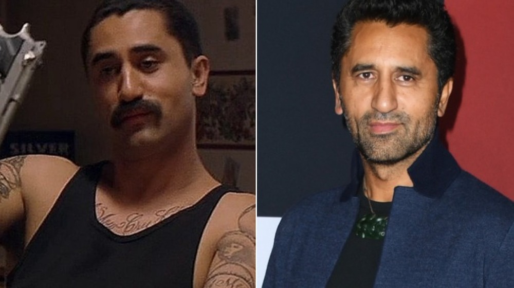 Cliff Curtis smirking