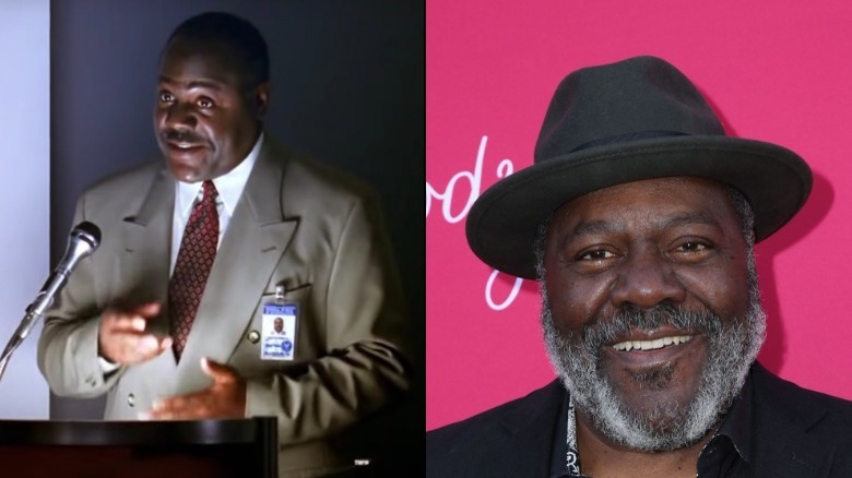 Elliot Gordon smiling microphone Frankie Faison hat