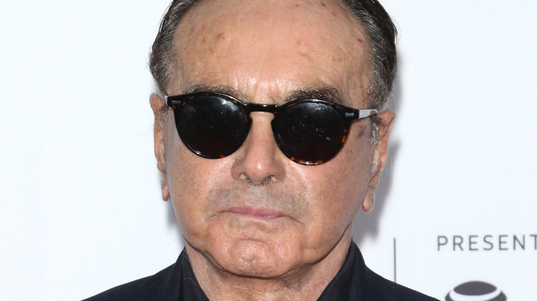 Dan Hedaya wearing sunglasses