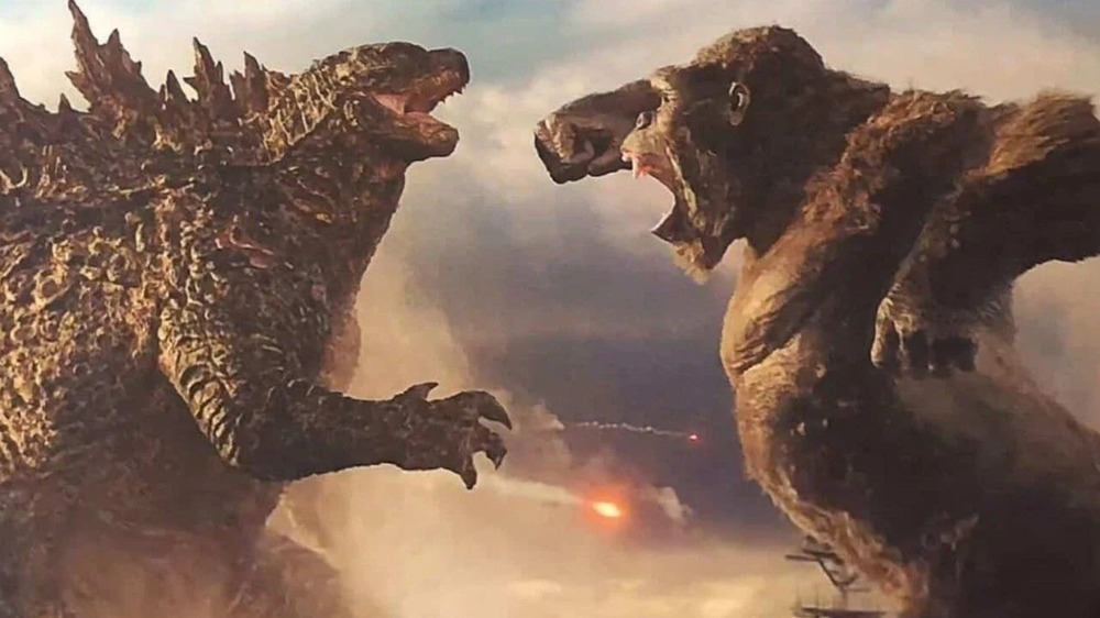 Godzilla and Kong fighting