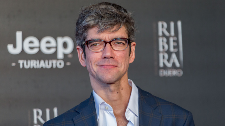 Javier Botet wearing glasses